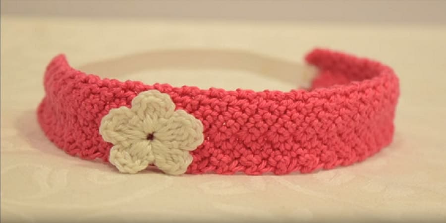 It's easy to make cute adorable Crochet Headband with flower. Make it in less than an hour! Perfect DIY gift idea for a baby shower, birthday or Christmas.