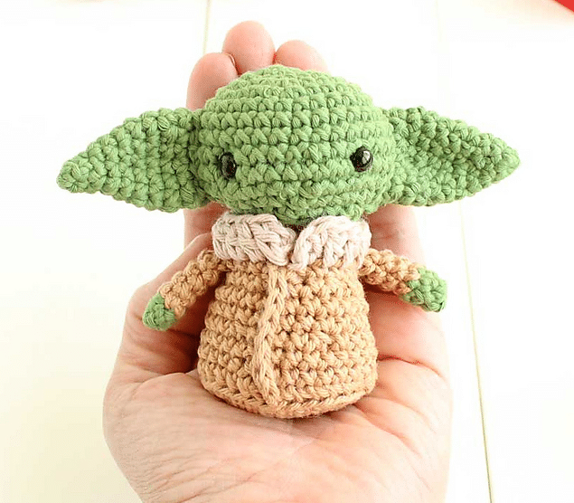 A Baby Yoda crochet pattern would be great for a cute gift to make someone smile. Try all of the different cute versions of baby Yoda crochet patterns. The best thing about this baby Yoda crochet pattern is that there aren’t too many pieces.